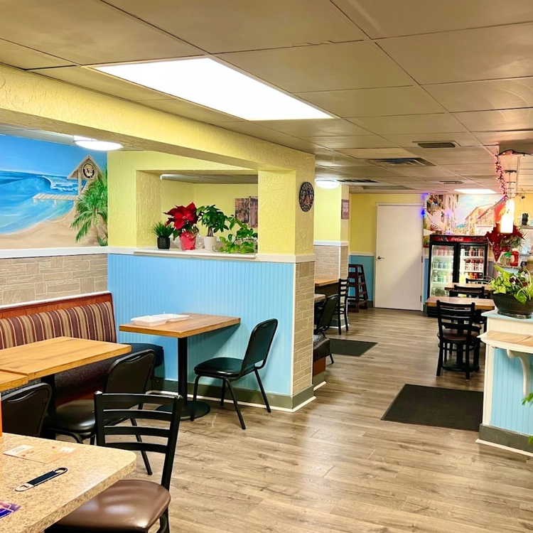 Lily's dining room in Indialantic, with its beach mural and booths